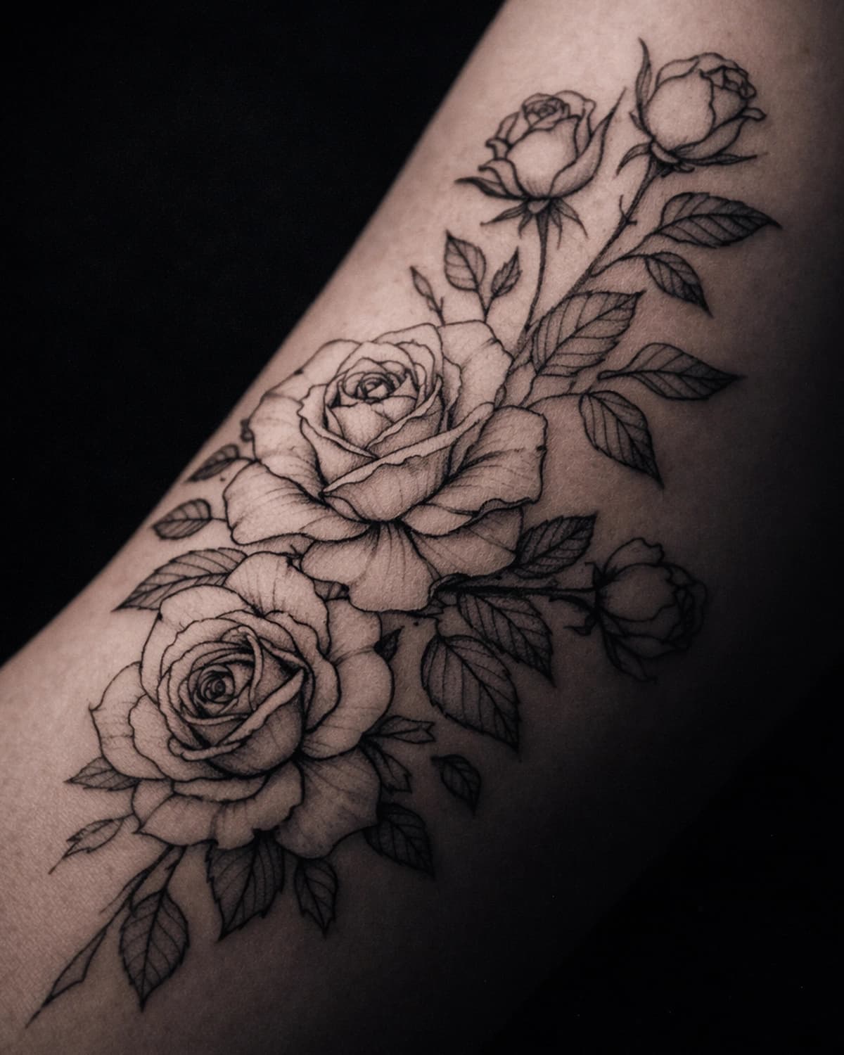 Fine-line botanical tattoo with subtle stem curvature