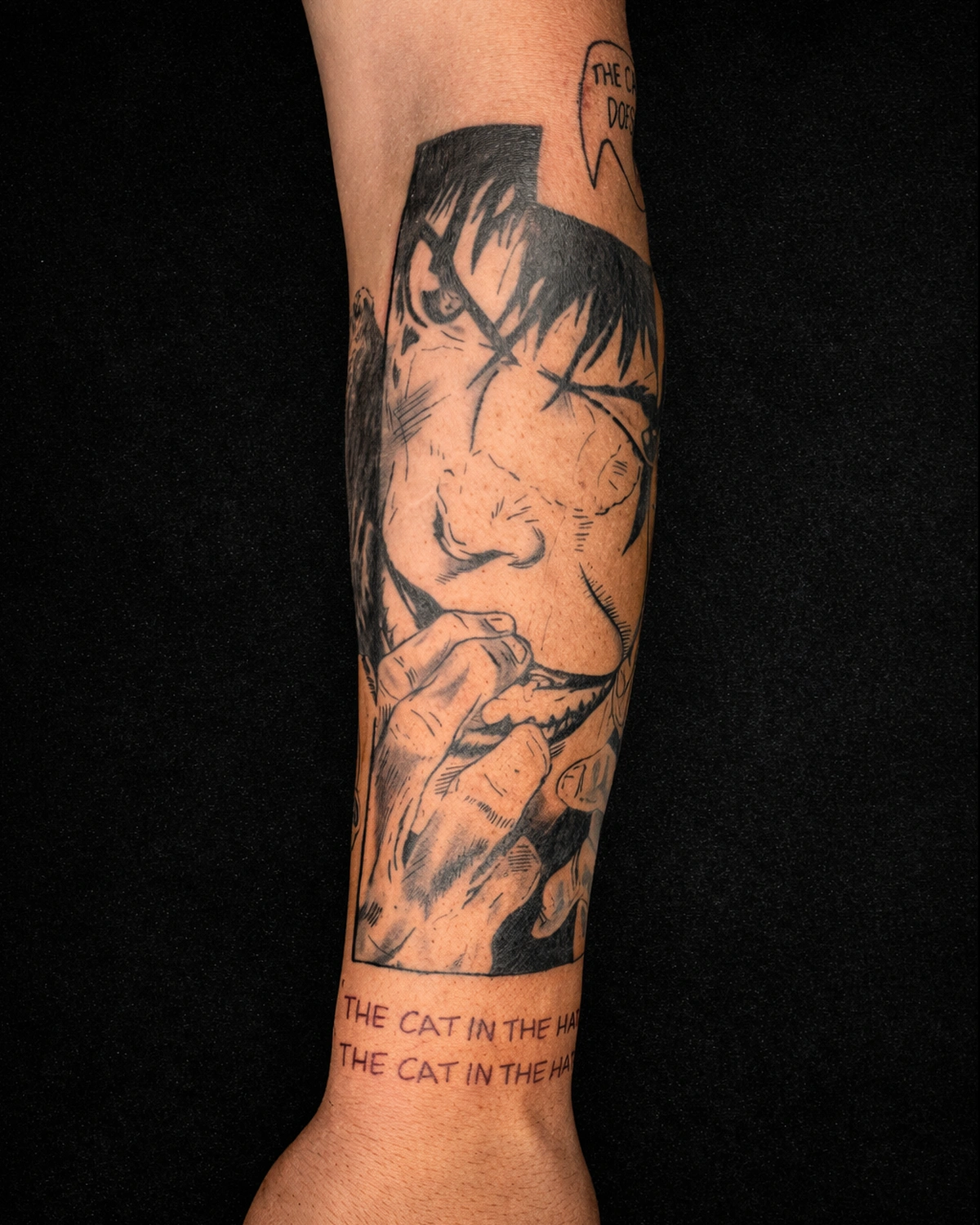 Manga panel style forearm tattoo with sharp linework and solid blacks
